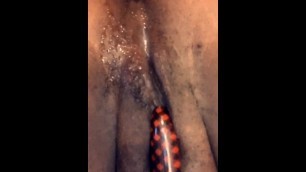 ebony teen plays with her clit until she squirts