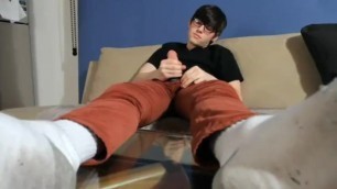 Beautiful big feet and play with his cock two