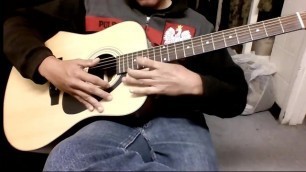 Man destroys guitar with big coch