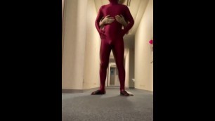 zentai play in hallway of the the hotel