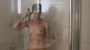 Young MILF with big ass taking a shower