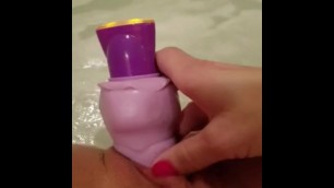 Hot wife using her vibrator in jacuzzi tub