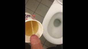 Pissing in a cup!