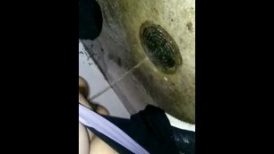 Pissing on the floor of a NASTY public bathroom!
