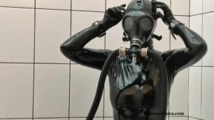 Black latex catsuit with gasmask