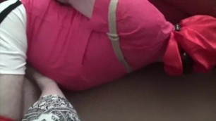 Tightly bound, gagged and hooded footballer in pink kit abused by femdom