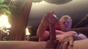 blonde male shootin his cum across the room