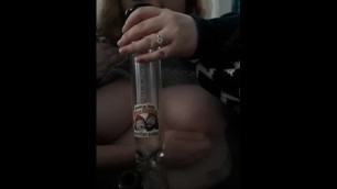 Girl smokes a bong while getting BIG TITS played with