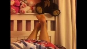 Friend's sexy feet playing in bed