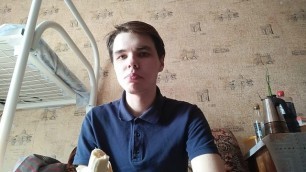 Russian guy sucking on a banana. A young guy has fun and sucks a banana.