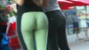 Candid Latina in green leggings great ass