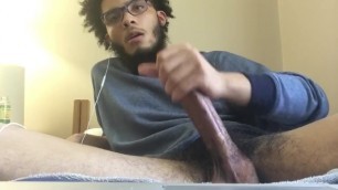 Sexy Black dude strokes his thick dick and cums