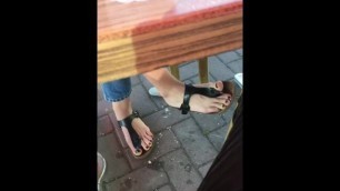 Turkish girl foot dangling sandals