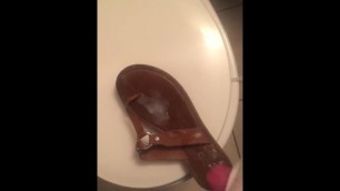 Cumming on a stolen leather sandal with a stolen dirty sock.