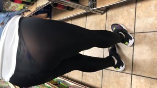 Black transparent tight bending over in store