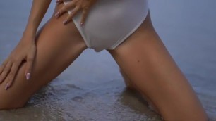 Sexual tiny girl wet on the beach