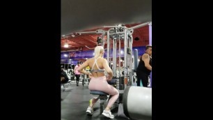 Tall blond at gym in peach leggings 03