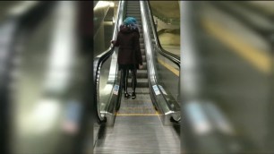 Wearing Latex on public escalator