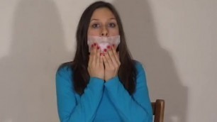linda self tape gagged and mouth stuffed repeatedly
