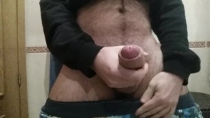Jerking Off His Fat Cock And Dumps a Big Thick Load