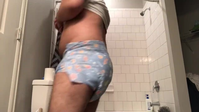 Chubby cub explores diapers