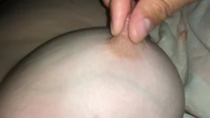 Playing with milf nipple