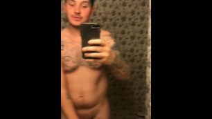 Tattooed guy showing off befor going in shower Italian