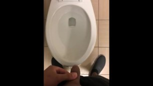Male peeing on toilet