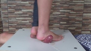 Underfoot cock and balls torture with cum out