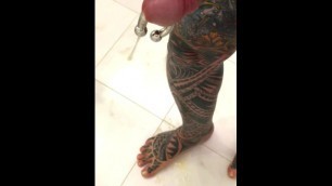 Fully tattooed Jacques Kiros ejaculates on his feet from his pierced cock