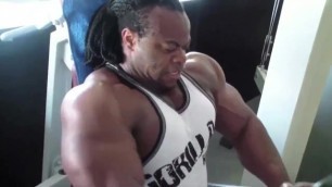 Muscle bull Clarence DeVis pumping and posing