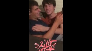 Two young men experiment with kissing