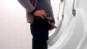 After he catches me watching, daddy shows off his mega thick cock at urinal