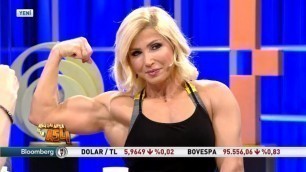 Girl Flexing for TV show host