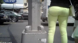 Big ass in green jeants on street