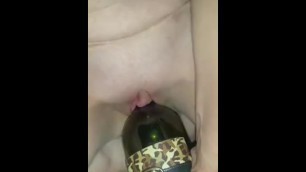 Wife fucks wine bottle