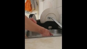 Washing Dishes In Hot Soapy Water