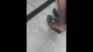 Candid pantyhose feet on subway