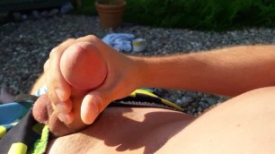 Jerking my cock outside in the sun