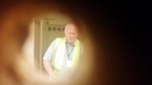 Spying on older man construction worker pissing