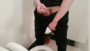 Just wanking the goose's neck in a public toilet
