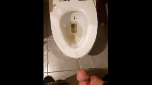 Pissing all over a toilet