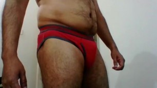 hot and sexy inidan man showing white underwear