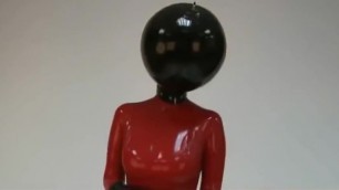 woman with latex balloon mask