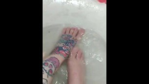 Soaking my feet! Enjoying your warm dick on my toes