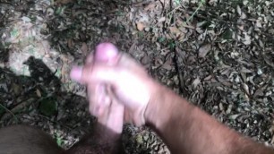 Jerking off in the bush and cumming hard