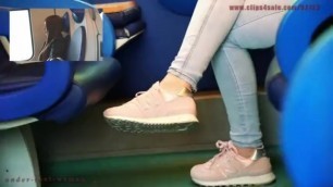Candid feet young girl in Pink sneakers crossed legs - 4k