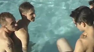 Four twinks get together to suck sweet dick in the pool
