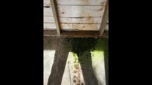 Piss spray on public park wall