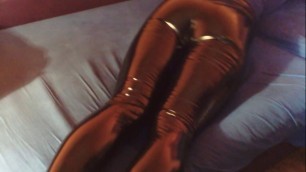 a moment of relaxation in latex leggings